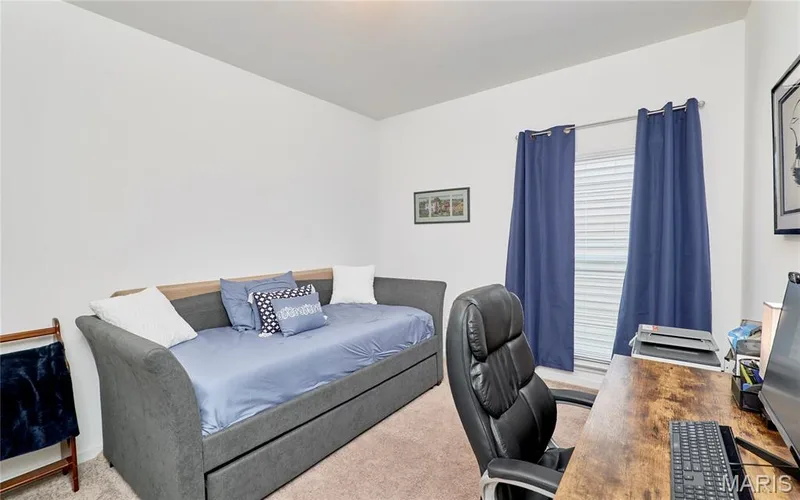Carpeted room with a window featuring horizontal blinds, a neutral wall color — 305 Copperfield Court, St Charles, MO 63301
