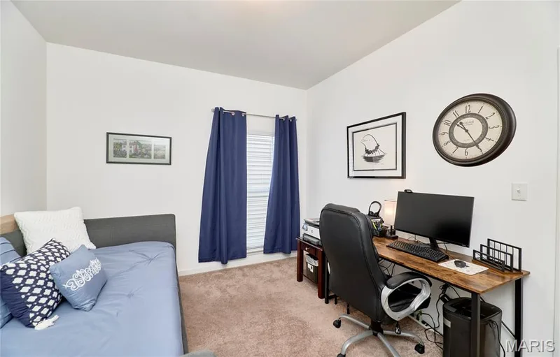 Carpeted room featuring a window with horizontal blinds, white walls — 305 Copperfield Court, St Charles, MO 63301