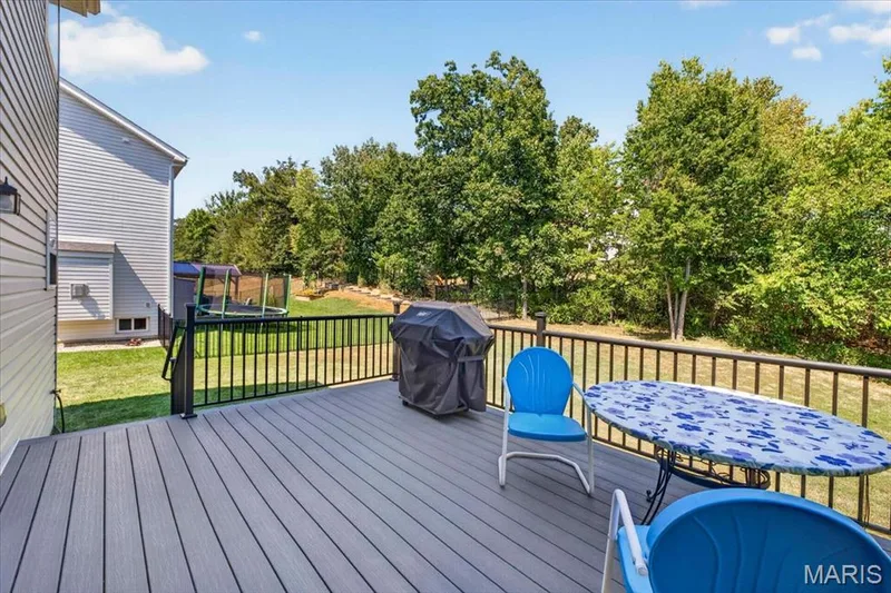 Deck overlooks private yard — 634 Creek Bend Drive, Lake St. Louis, MO 63367