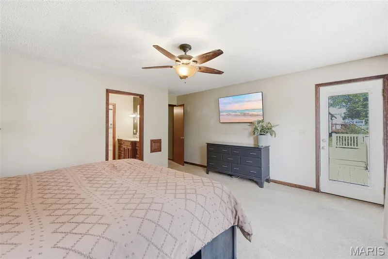Primary Bedroom with direct access to the deck — 8 Ardwick Drive, St Peters, MO 63376