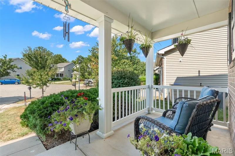 Inviting covered front porch — 166 Brushy Brook Drive, O'Fallon, MO 63366