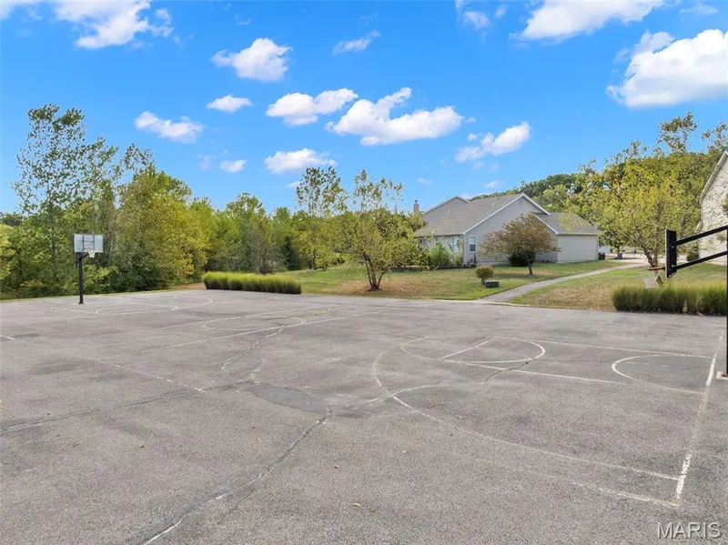 Neighborhood Basketball court for the kids' play or adult pick-up games. — 166 Brushy Brook Drive, O'Fallon, MO 63366