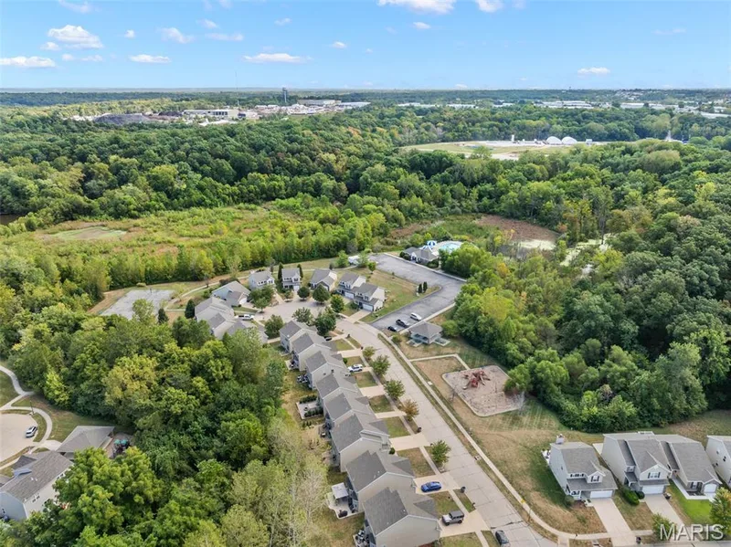 Enjoy the comfort of a neighborhood community with peaceful, natural woods right in your backyard. — 166 Brushy Brook Drive, O'Fallon, MO 63366