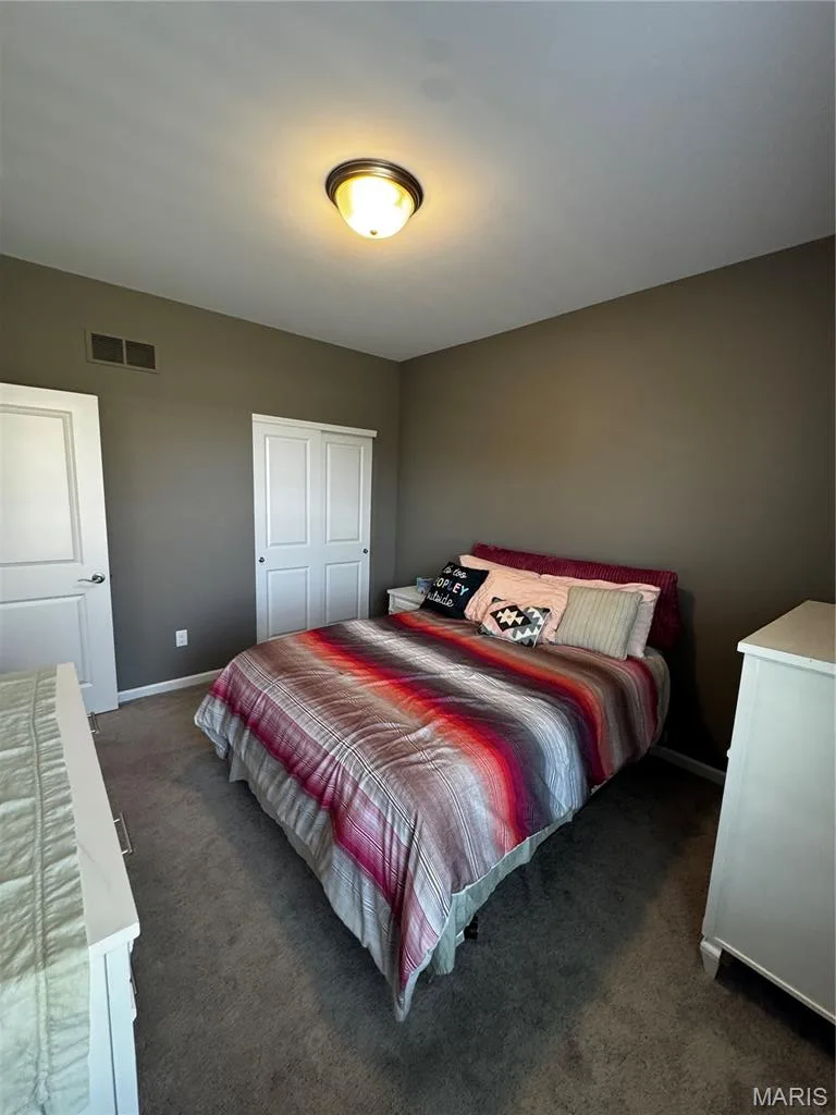 Wall-to-wall carpeting and solid core doors — 401 Copperfield Court, St Charles, MO 63301