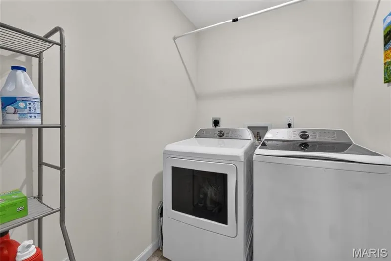 Upper level laundery room! Electric hookup & lots of storage — 427 Sunset Hollow Drive, Wentzville, MO 63385