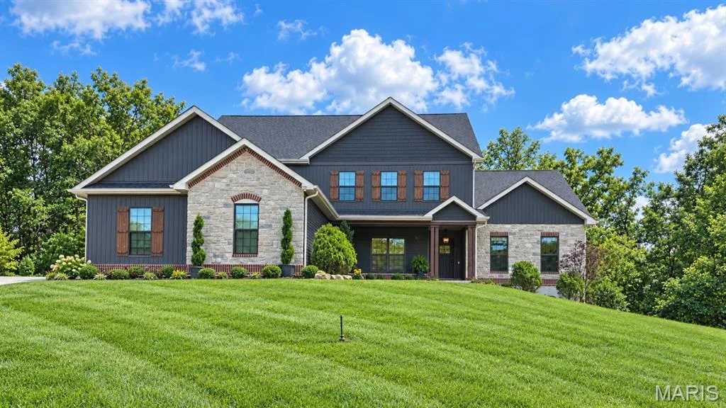 5 bed 4 bath 3800+ Sqft. 3 Car Garage, & a Stocked Pond — 305 Crescent Oak Court, New Melle, MO 63385