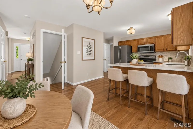 Kitchen/Breakfast room.  Virtually staged. — 5 Revolutionary Way Court, O'Fallon, MO 63366