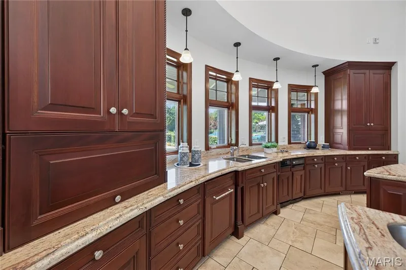 Radius wall of windows overlooking the pool — 7 Hillside Court, Wentzville, MO 63385