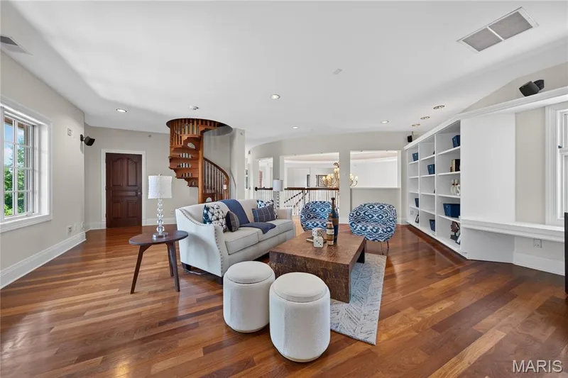Upper level family room with spiral staircase leading to princess tower — 7 Hillside Court, Wentzville, MO 63385