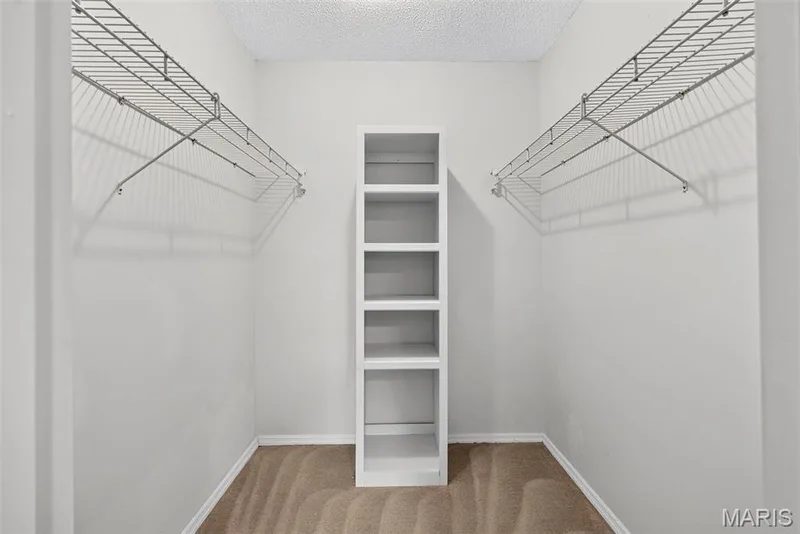Primary bedroom walk-in closet! — 1511 Hampton Hall Drive #18, Chesterfield, MO 63017