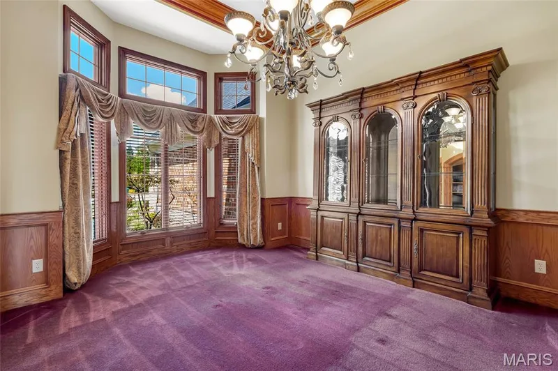 Formal dining room featuring a beautiful bay window that fills the space with natural light. — 4030 Austin Drive, St Charles, MO 63304