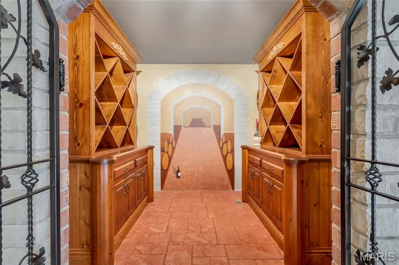 Custom hobby room designed with the wine enthusiast in mind, offering the perfect space to showcase and enjoy your collection. — 4030 Austin Drive, St Charles, MO 63304
