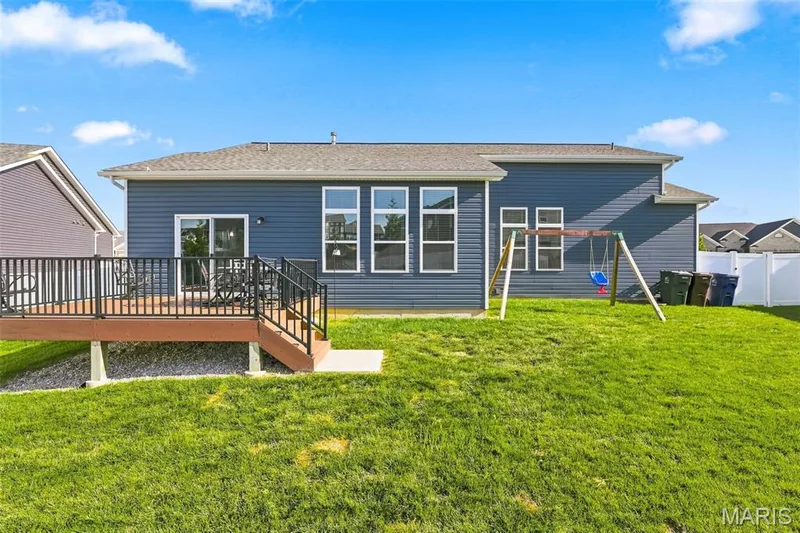 Back of Home with spacious deck and fenced level yard. — 130 Pomodora Circle, Wentzville, MO 63385