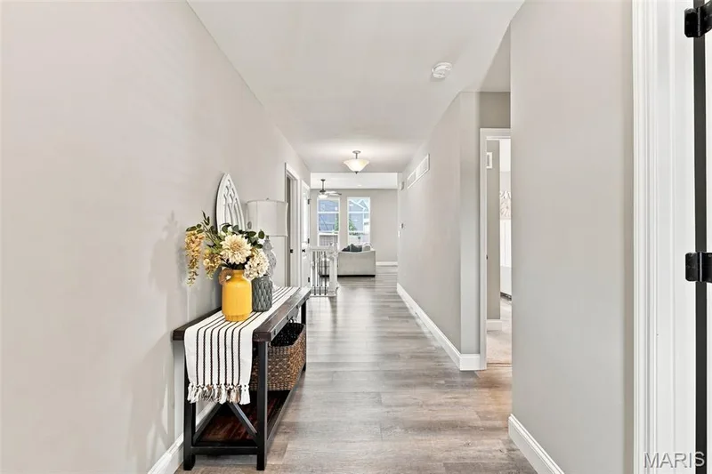 Tall ceilings, luxury vinyl flooring, Colonial style doors, Main Floor Laundry — 130 Pomodora Circle, Wentzville, MO 63385