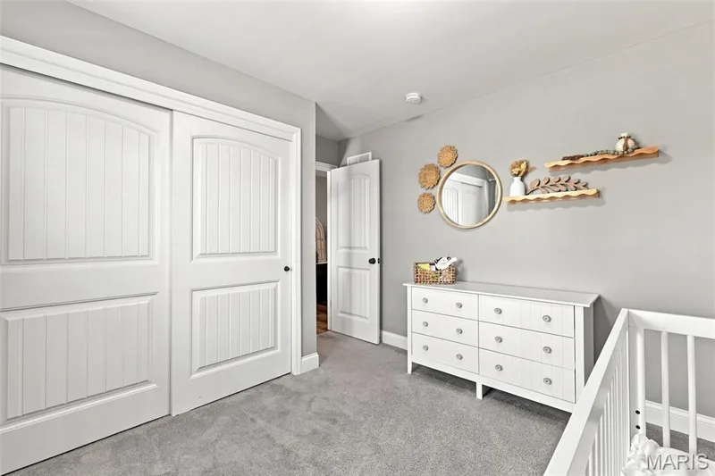 Bedroom one with spacious closet and neutral (3) walls — 130 Pomodora Circle, Wentzville, MO 63385