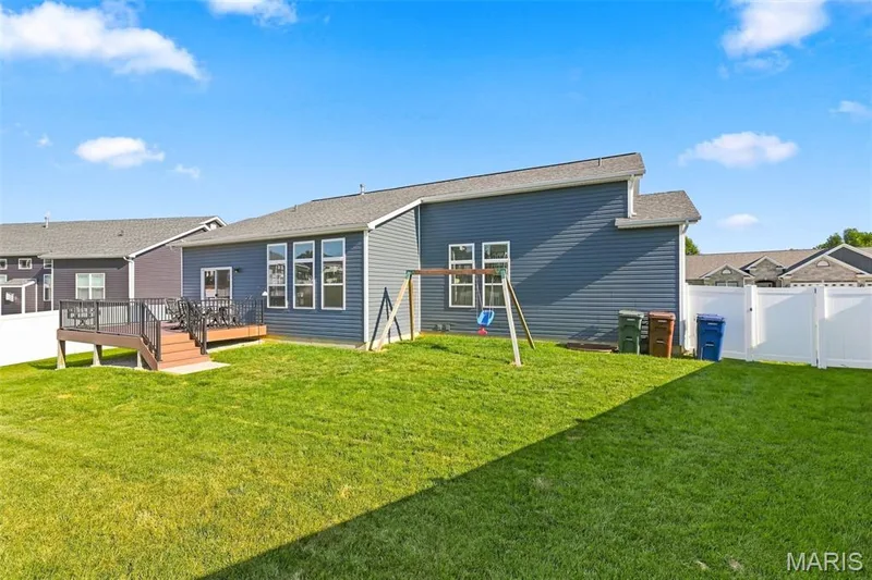 Fenced level back yard with deck — 130 Pomodora Circle, Wentzville, MO 63385