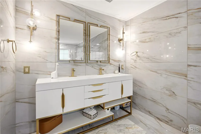 Dual vanity with integrated sinks, and under-cabinet storage — 308 Graywynd Court, Lake St. Louis, MO 63367