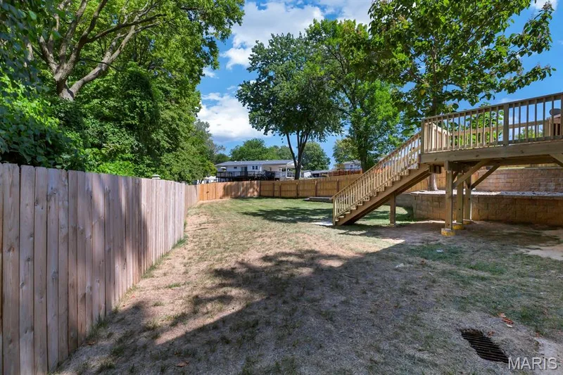 Backyard view from left side of home.  No neighbors on this side of the home! — 3424 La Salle Drive, St Charles, MO 63301