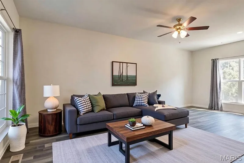 Virtually staged family room — 456 Dusty Brook Drive, O'Fallon, MO 63366