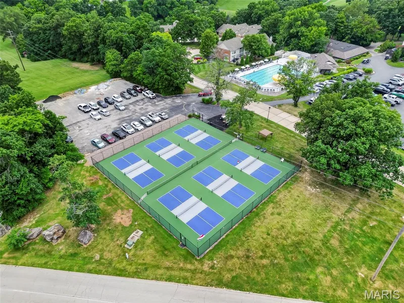 Six outdoor courts with blue and green surfaces, fenced perimeter — 622 Cruden Bay Court, Dardenne Prairie, MO 63368