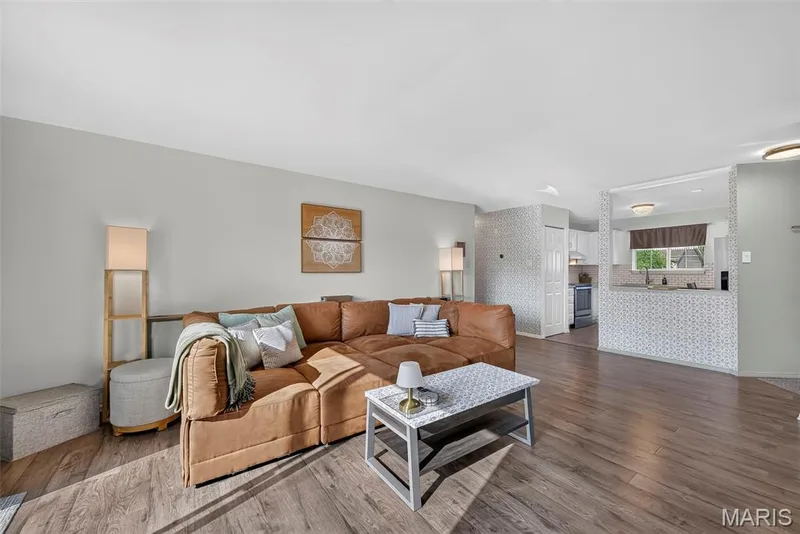 Spacious Living Room with Plank Flooring — 74 Sugar Glen Court #6, St Peters, MO 63376