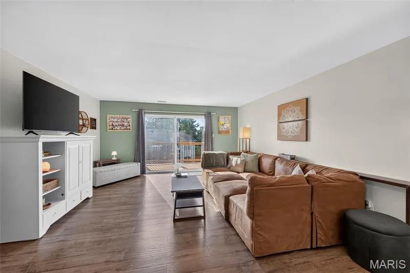 Large Living Room with Sliding Door to a Deck, New in 2026 — 74 Sugar Glen Court #6, St Peters, MO 63376