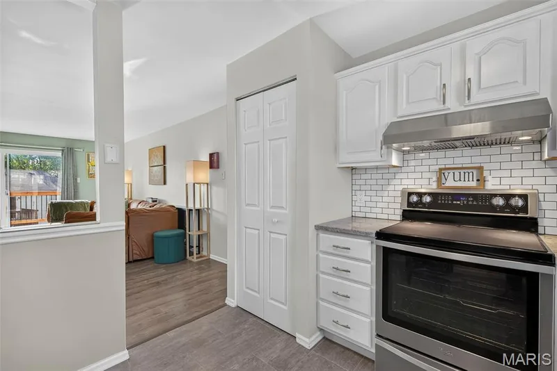 Stainless Steel Range Hood and Smooth Top Stove — 74 Sugar Glen Court #6, St Peters, MO 63376