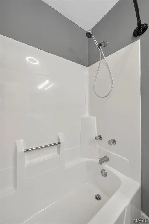Tub/Shower in the Secondary Bedroom — 74 Sugar Glen Court #6, St Peters, MO 63376