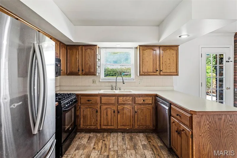 Window over sink looks out over level backyard! — 109 Meadowlark Lane, St Charles, MO 63301