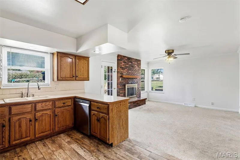Kitchen opens to the family room — 109 Meadowlark Lane, St Charles, MO 63301