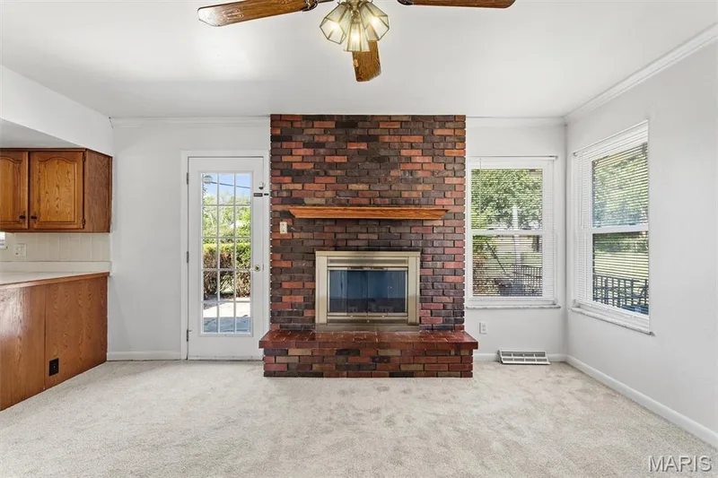 Cozy, woodburning fireplace in the family room — 109 Meadowlark Lane, St Charles, MO 63301