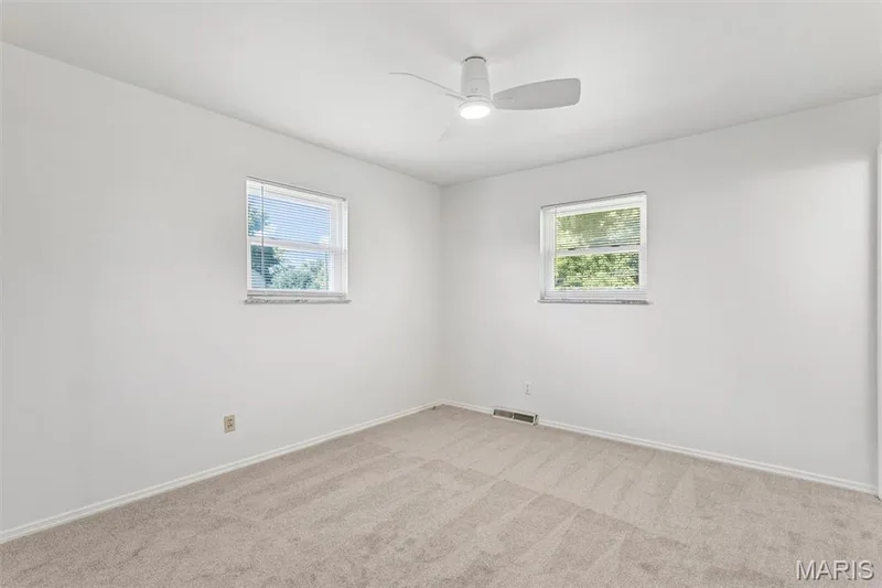 Primary Bedroom features new carpet and fresh paint! — 109 Meadowlark Lane, St Charles, MO 63301