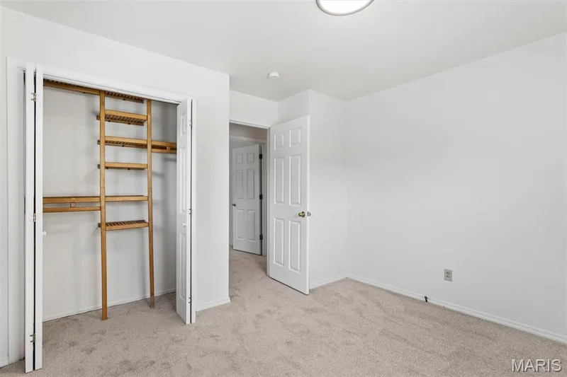 Bedroom #3 featuring organization system in closet — 109 Meadowlark Lane, St Charles, MO 63301
