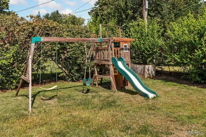 Swingset in backyard — 109 Meadowlark Lane, St Charles, MO 63301