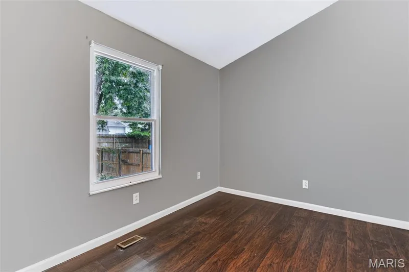 Vaulted ceiling with a neutral paint palette — 1314 Warrior Song Way, O'Fallon, MO 63366