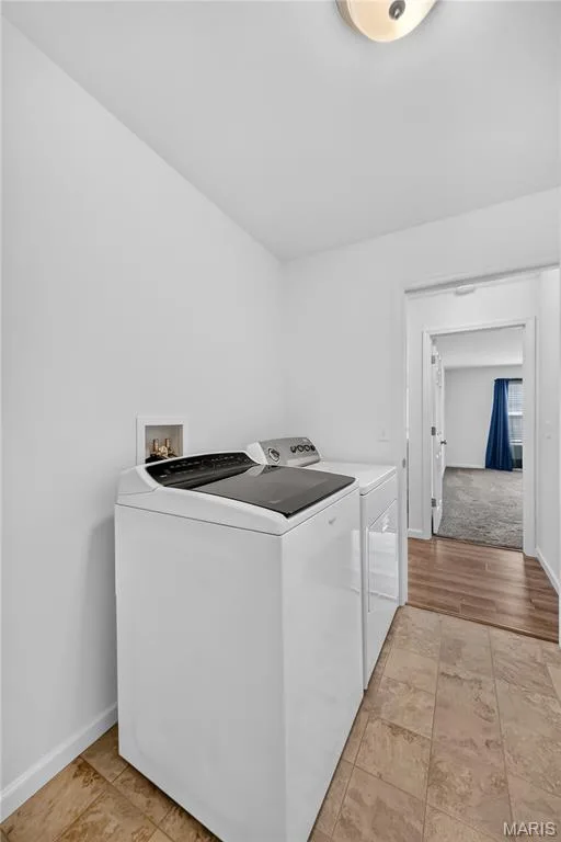 Main floor laundry room — 619 Wilmer Meadow Drive, Wentzville, MO 63385