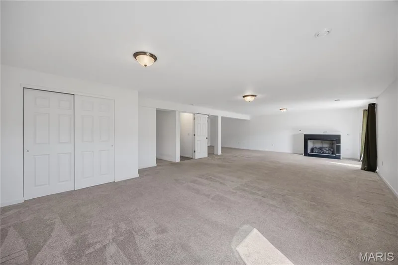 Lower level family room with Gas Fireplace — 619 Wilmer Meadow Drive, Wentzville, MO 63385