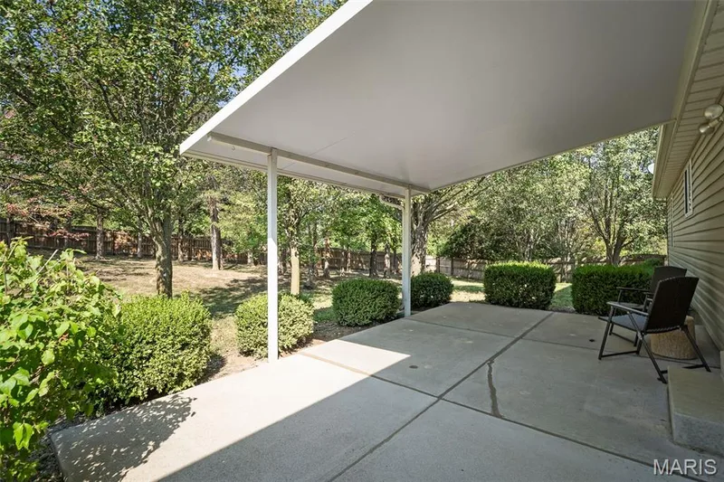 COVERED PATIO in a nearly 1/2 acre backyard — 86 Sun Haven Court, Wentzville, MO 63385