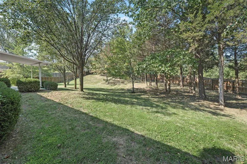 Beautiful backyard with mature trees and shade. — 86 Sun Haven Court, Wentzville, MO 63385