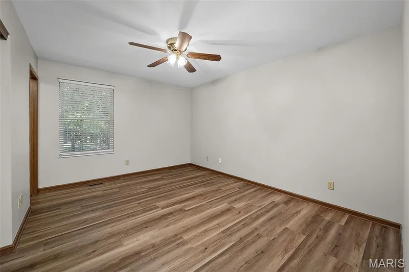 Primary with en suite bathroom and ceiling fan. — 86 Sun Haven Court, Wentzville, MO 63385