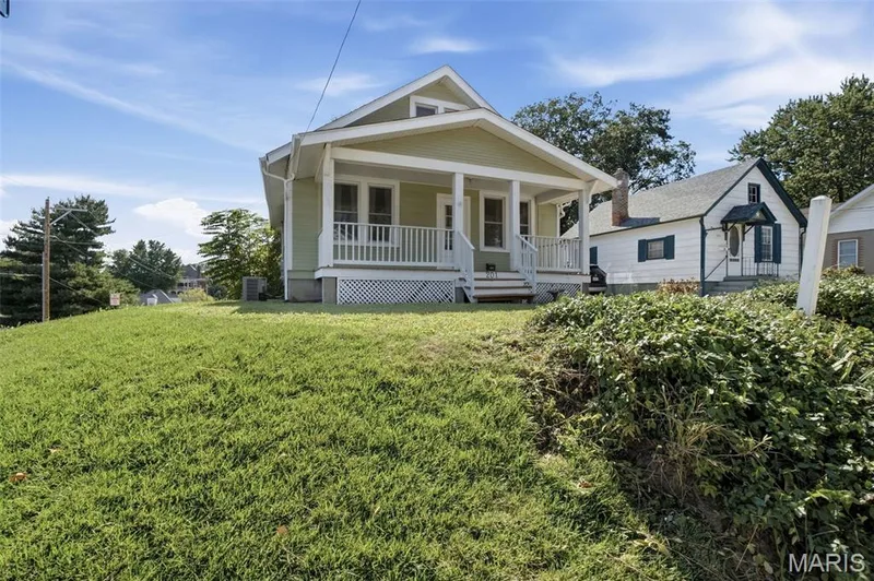 Situated on a beautiful corner lot just moments from Katy Trail and Historic Downtown St. Charles — 201 Perry Street, St Charles, MO 63301