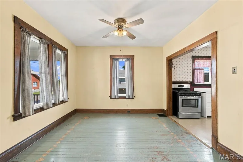 Formal Dining Room with painted wood floors — 201 Perry Street, St Charles, MO 63301