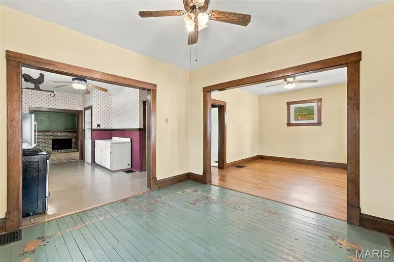 Formal Dining Room with painted wood floors — 201 Perry Street, St Charles, MO 63301