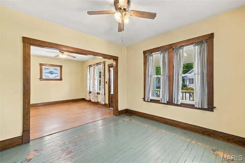 Formal Dining Room with painted wood floors — 201 Perry Street, St Charles, MO 63301
