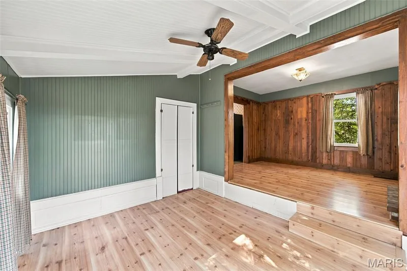 Light and bright sunroom with vaulted ceiling has newly installed sliding doors that lead to the backyard — 201 Perry Street, St Charles, MO 63301