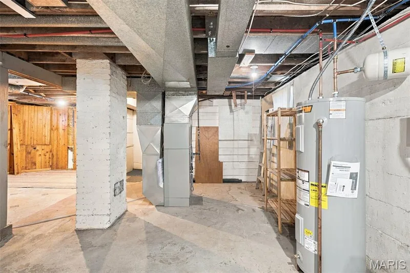 Brand new water heater and tons of storage in the unfinished basement — 201 Perry Street, St Charles, MO 63301