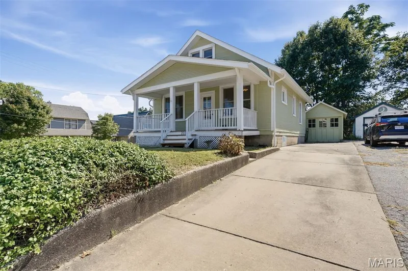 Curb appeal, ideal location, historic charm and endless possibilities at 201 Perry Street — 201 Perry Street, St Charles, MO 63301