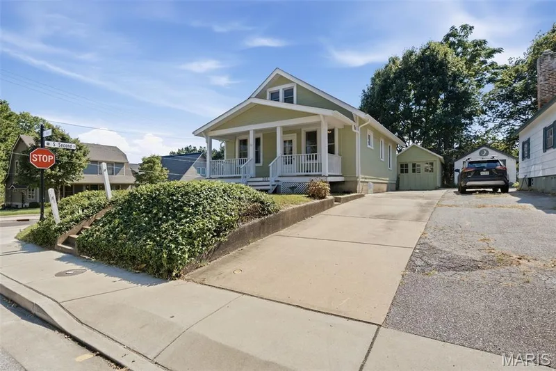 Curb appeal, ideal location, historic charm and endless possibilities at 201 Perry Street — 201 Perry Street, St Charles, MO 63301