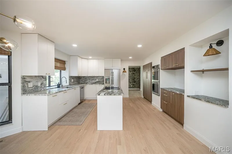 Chef's dream! Brand new kitchen with double wall oven, oversized island and plenty of storage! — 440 Meramec Way, St Charles, MO 63303