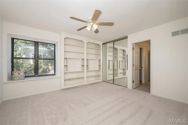 Bedroom 2 upstairs features built ins — 440 Meramec Way, St Charles, MO 63303